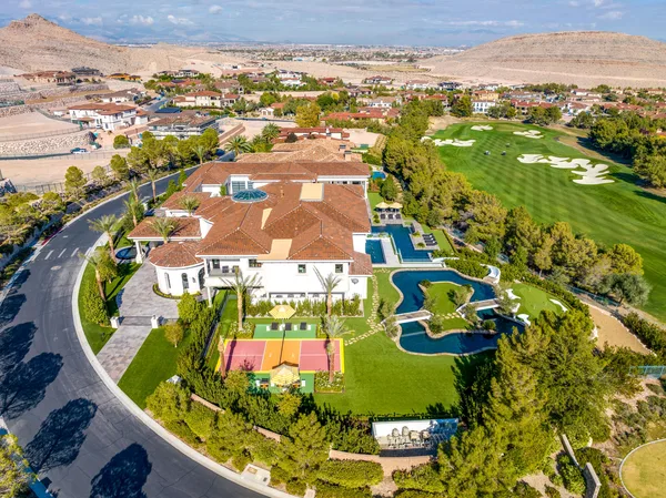 Aerial pool putting green and backyard sport court in La Quinta