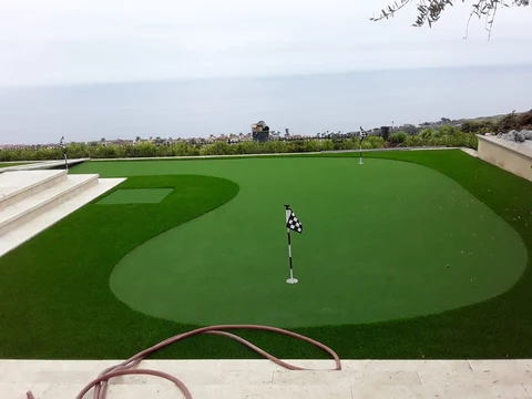 Artificial turf putting green overlooking the coast