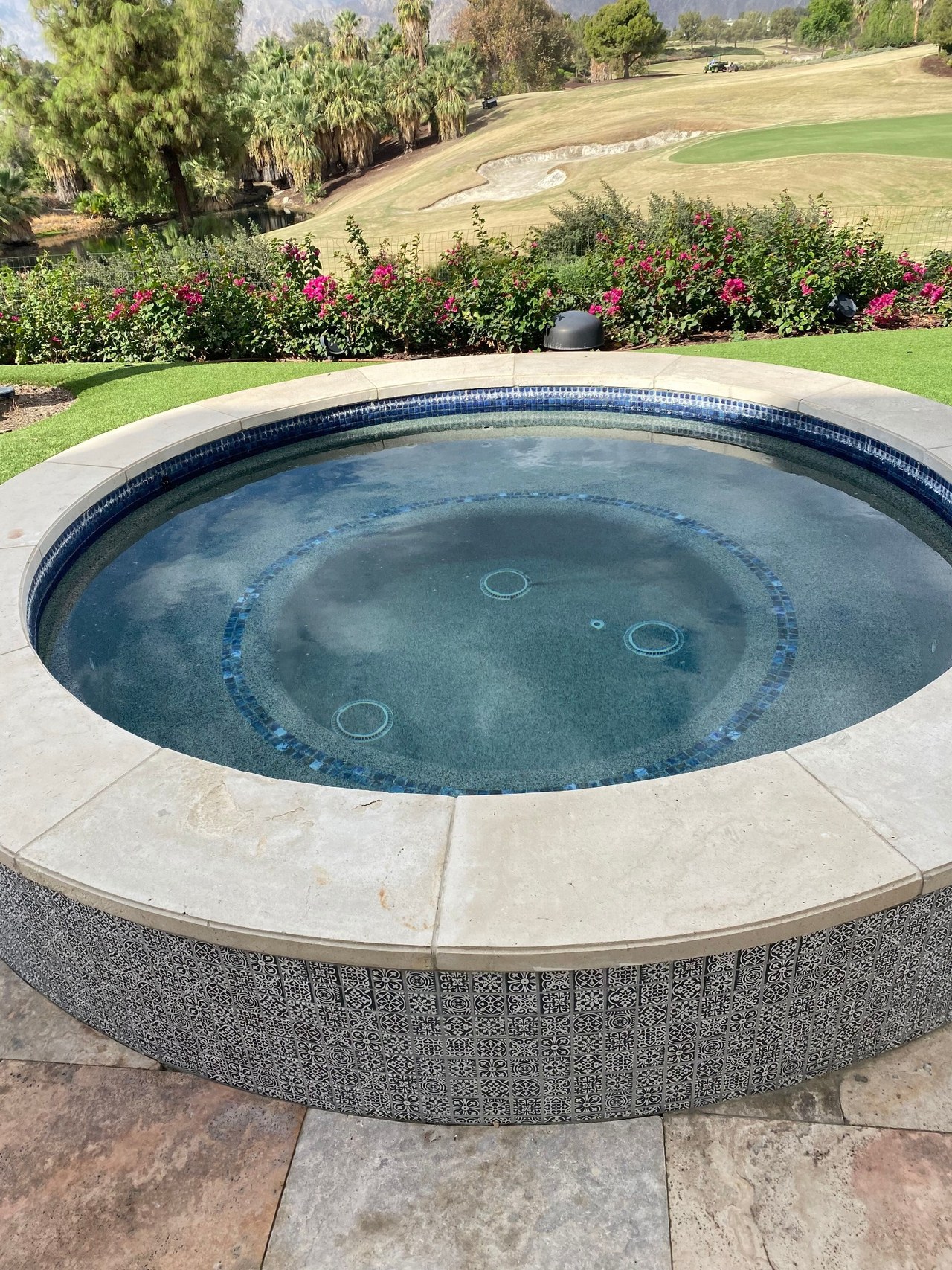 Before Madison Club circular spa and rounded coping
