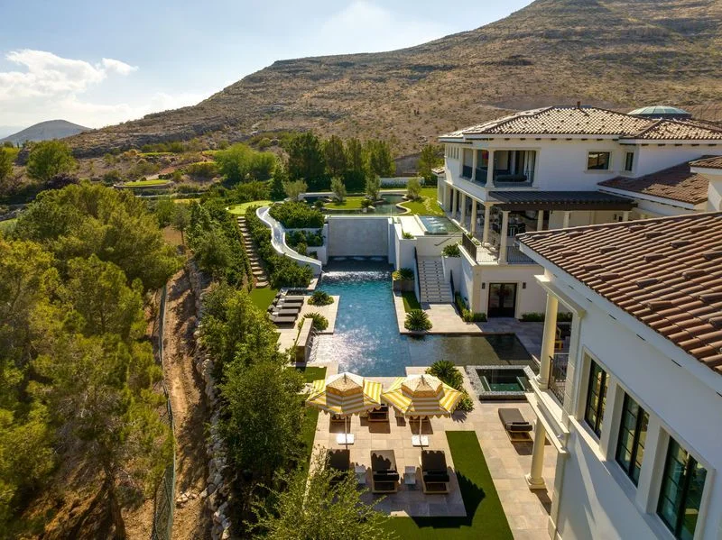 Elevated view of pool terrace and lounge seating in La Quinta