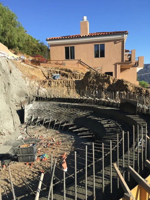 Hillside pool excavation and structural reinforcing steel