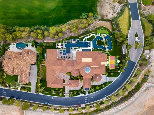Overhead estate landscape pool and sport court in La Quinta