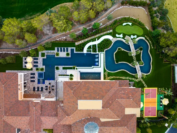 Overhead pool geometry putting green and court in La Quinta