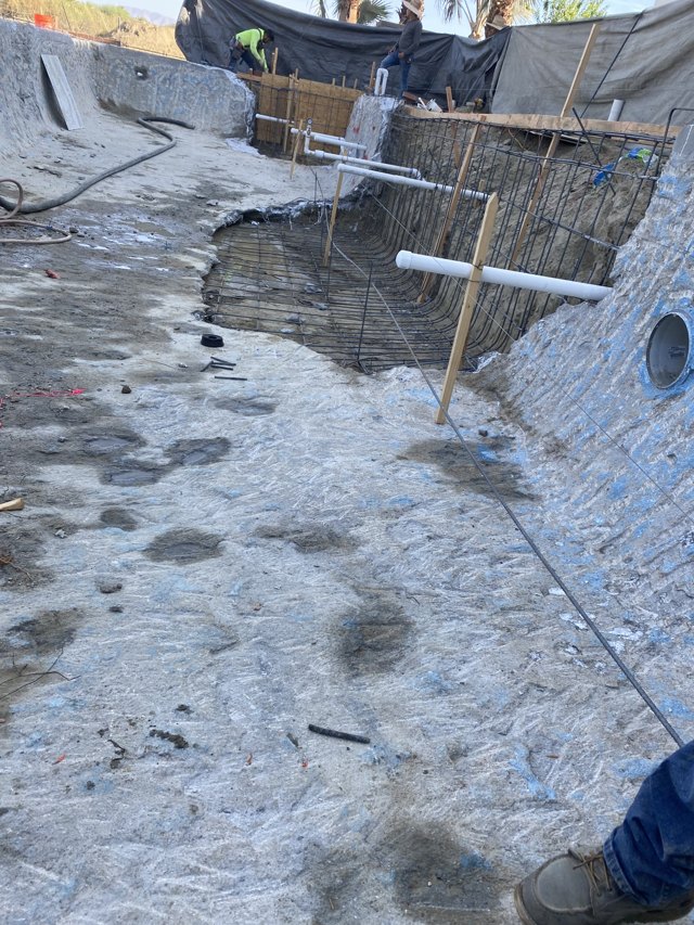 Rebar and formwork connecting new and existing pool geometry