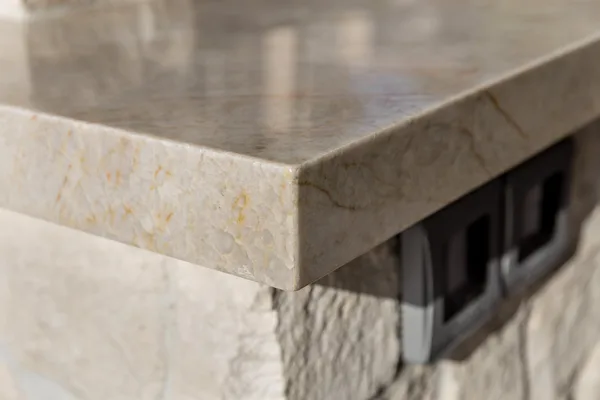 Thick stone counter corner and textured stone base