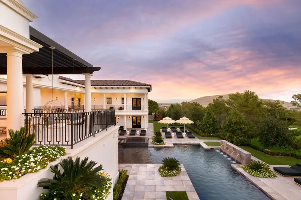 Upper terrace view of pool and sunset garden in La Quinta