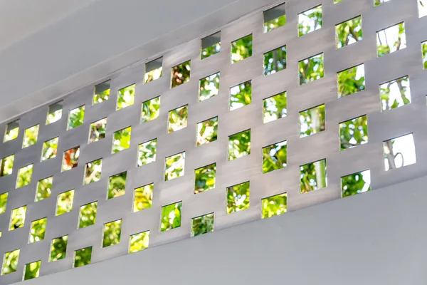 White perforated garden screen wall